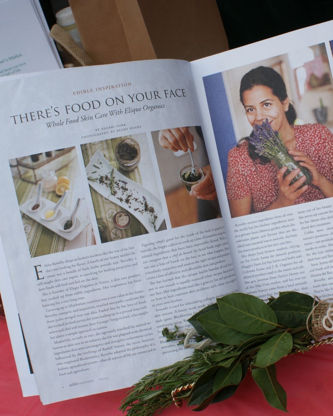 Open magazine with article about food and skincare, featuring images of dishes, ingredients, and a woman holding flowers.