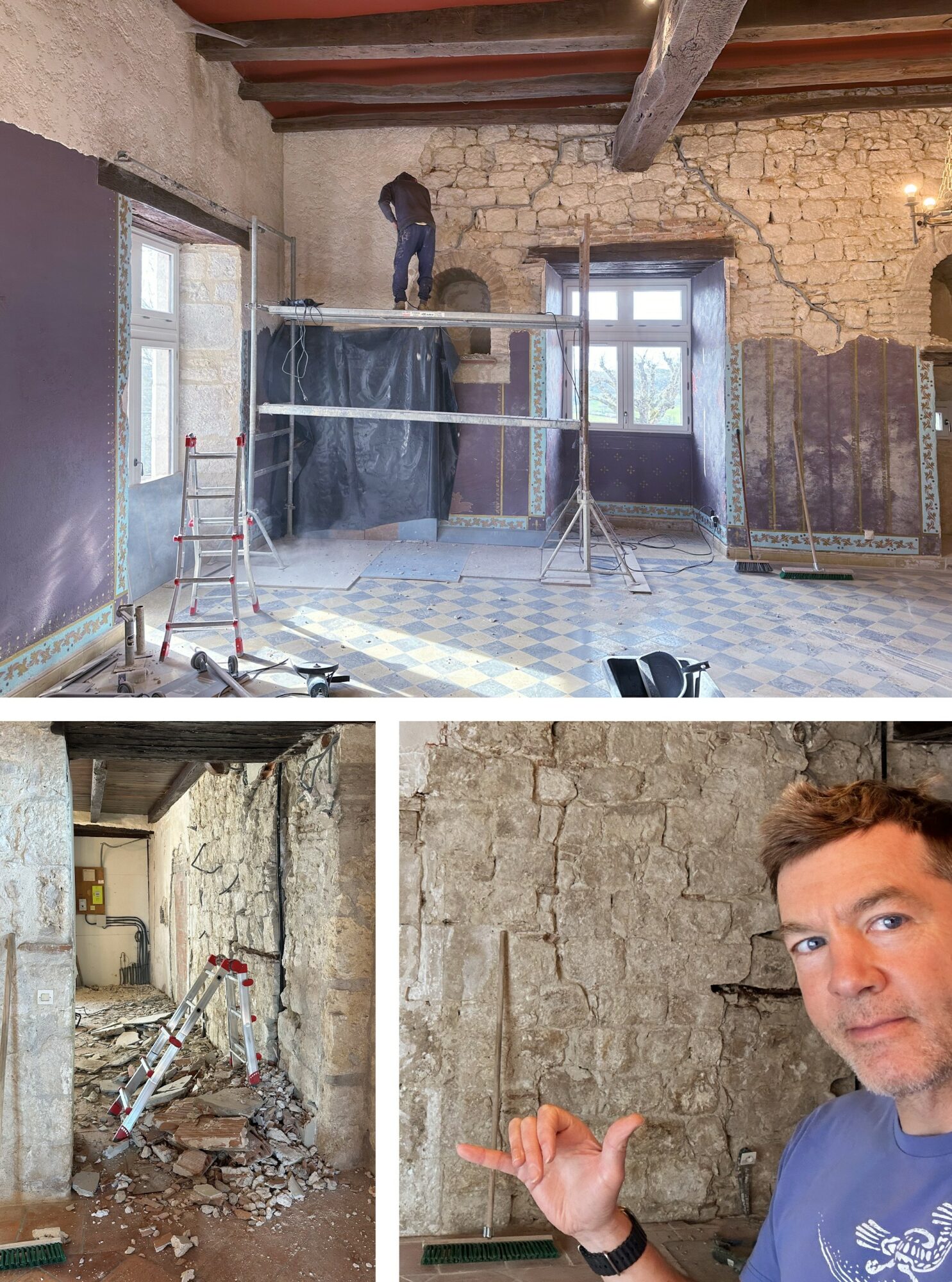 Man working on scaffolding inside a room with stone walls and large windows, construction tools and debris on the floor.