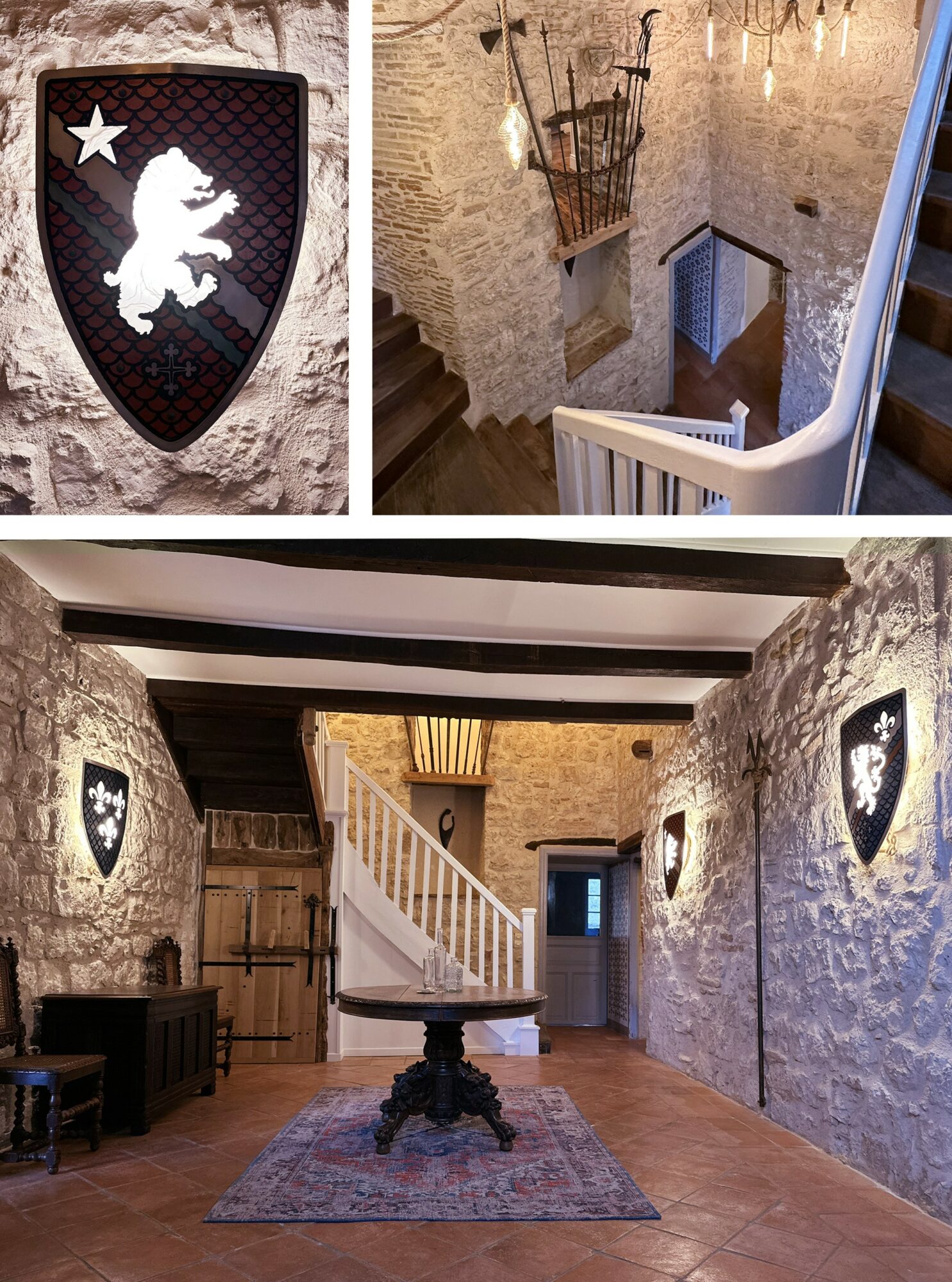 Interior view of a stone-walled room with a staircase, shield decorations, and a table with a decorative object, wooden floor.