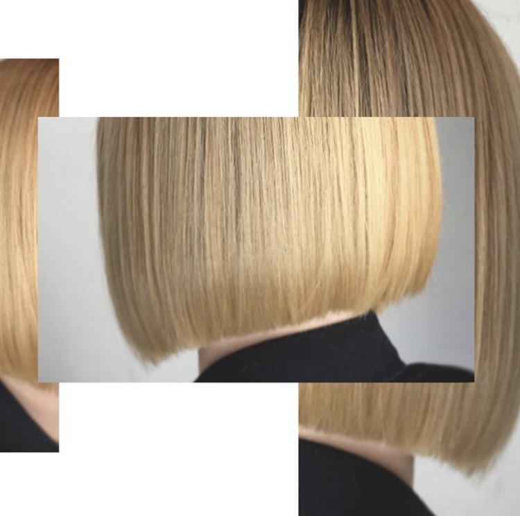 Blonde bob haircut with straight, smooth hair and blunt ends, viewed from the side.