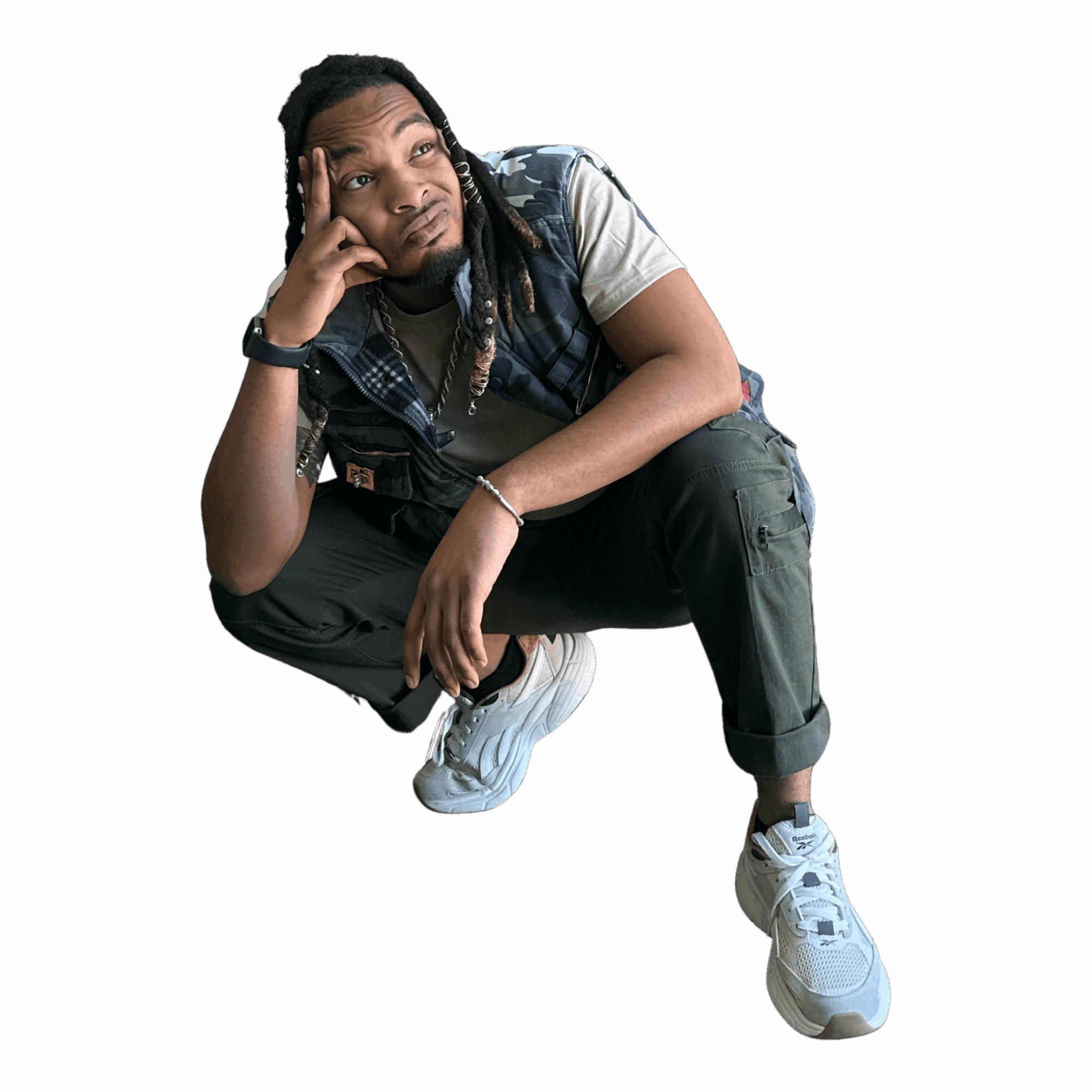Person crouching with hand on face, wearing a vest, t-shirt, pants, and sneakers, against a black background.