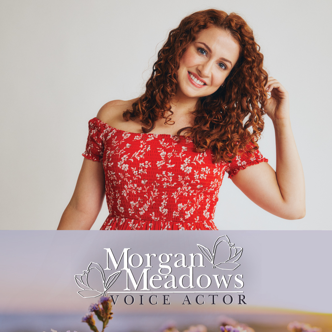 Young woman with curly hair smiling, wearing a red floral off-shoulder dress, against a plain background.