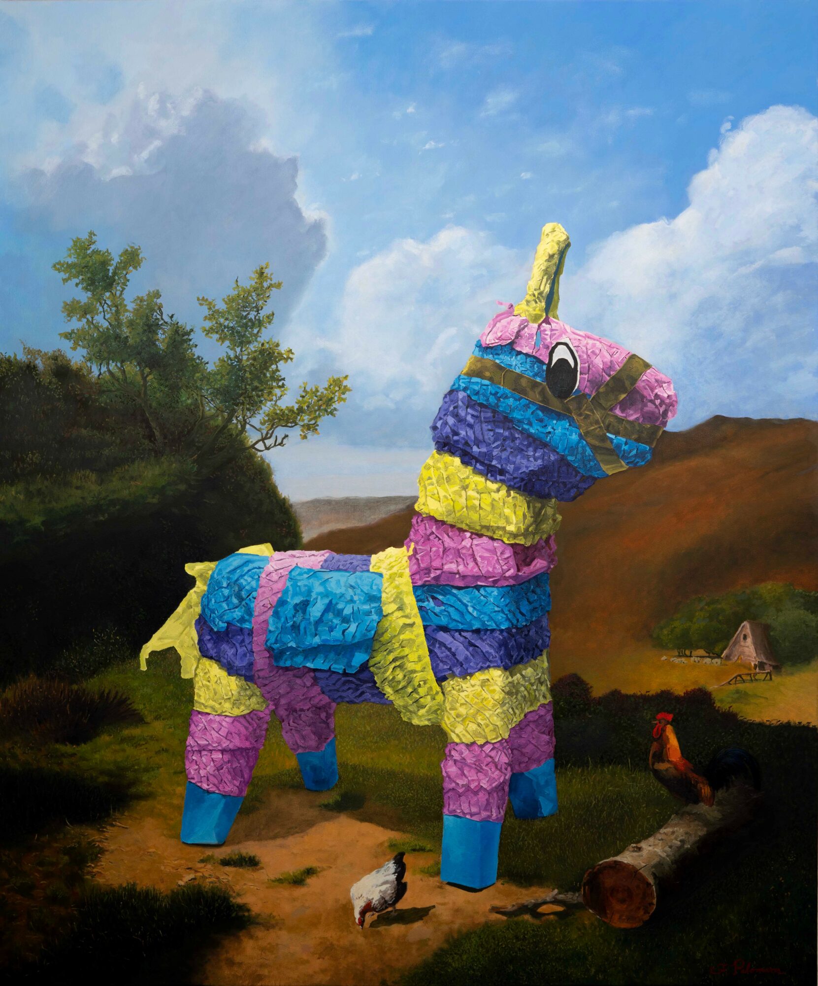 Colorful unicorn sculpture made of flowers or fabric in a rural landscape with trees, hills, and a small house.